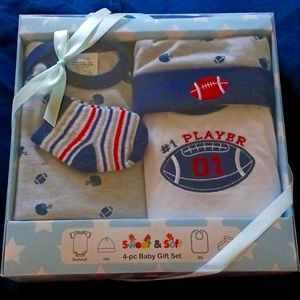 4 pice newborn gift set for a boy.